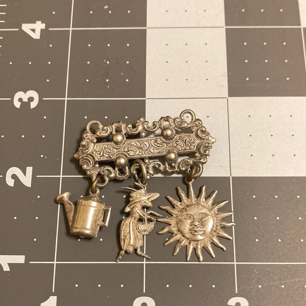 Pewter tone garden themed pin